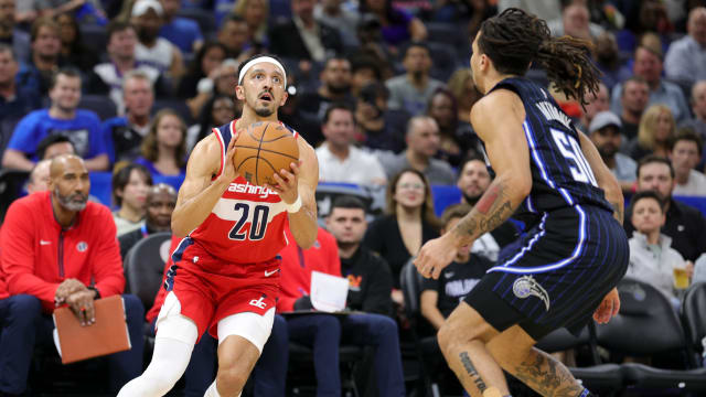 Dec 1, 2023; Orlando, Florida, USA; Washington Wizards guard Landry Shamet (20) looks to shoot a three pointer while guarded by Orlando Magic guard Cole Anthony (50) in the fourth quarter at Amway Center. Mandatory Credit: Nathan Ray Seebeck-USA TODAY Sports